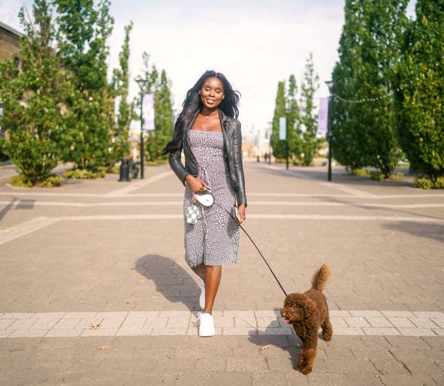 woman walking her dog in Thamesmead