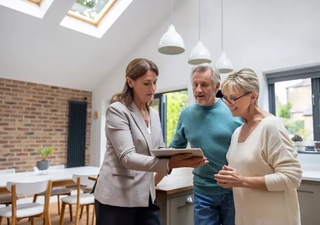 A couple discussing Shared Ownership with an advisor