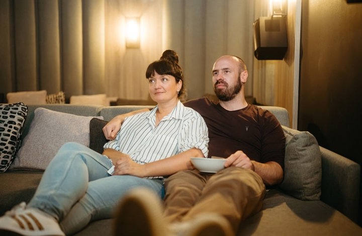 Robert and Kate - Homeowners at Three Waters on Sofa