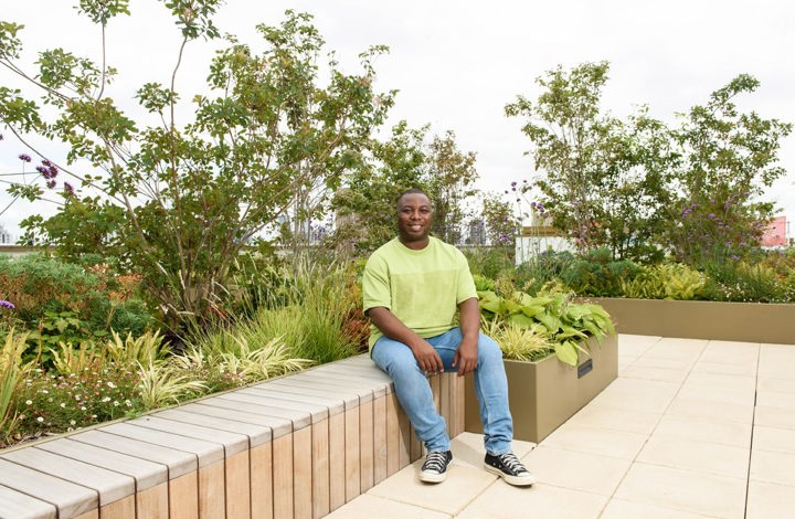 man sat on landscaped rooftop of his Oval home