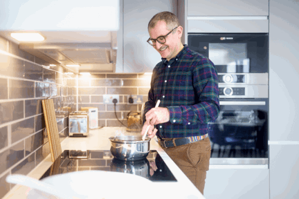 Man cooking in his kitchen