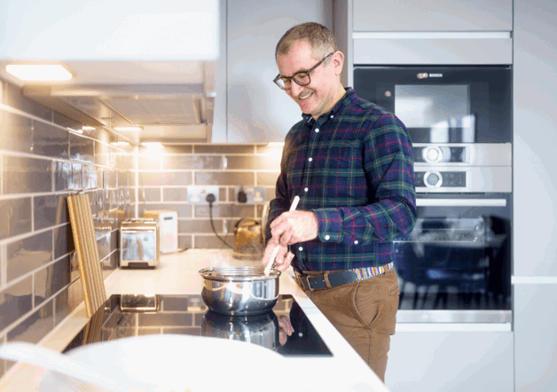 Man cooking in his kitchen