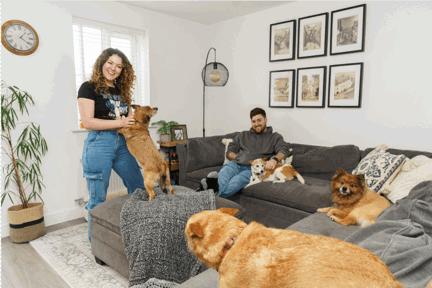 Two Shared Ownership homeowners in their living room